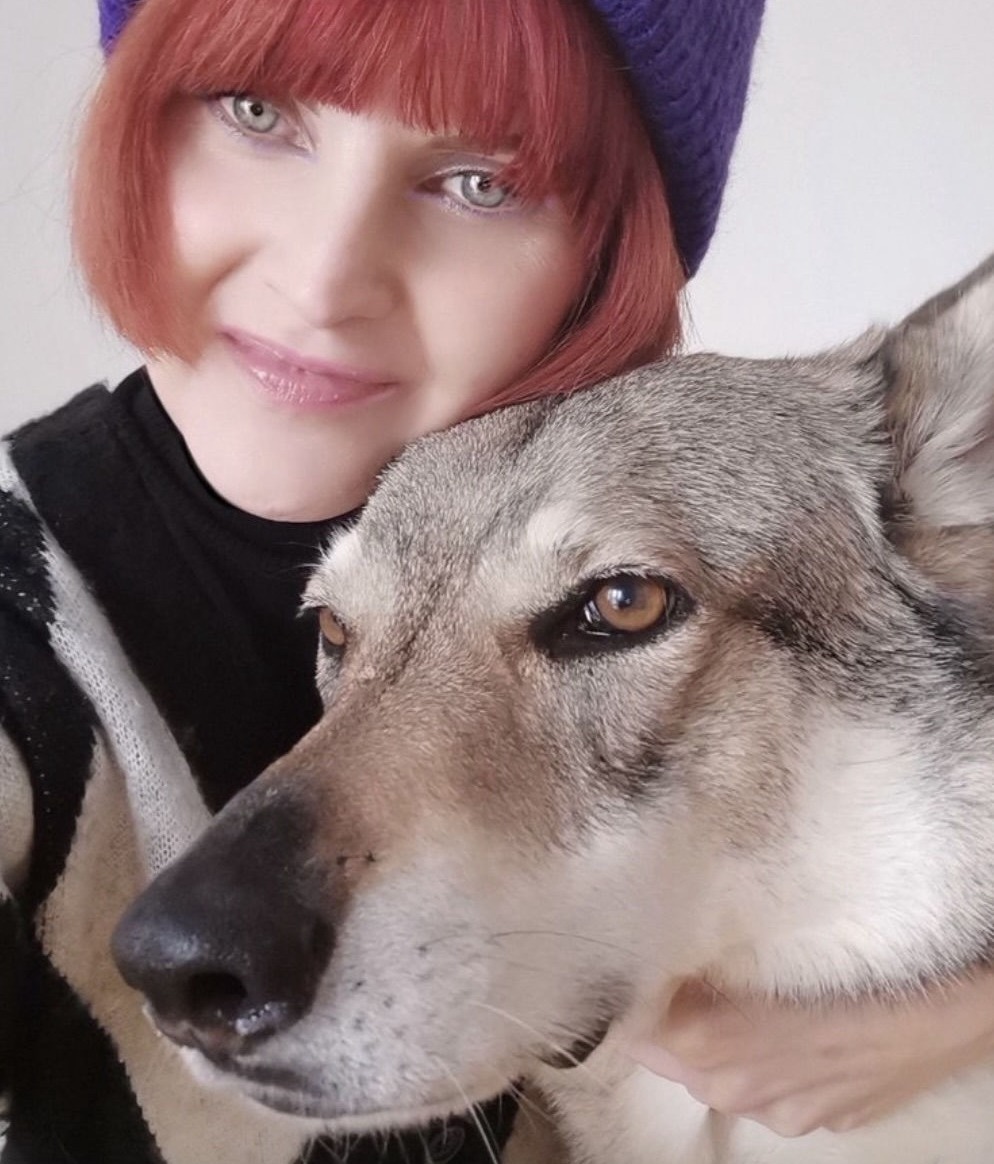 Artist Andrea Hrnjak and her Wolfdog.